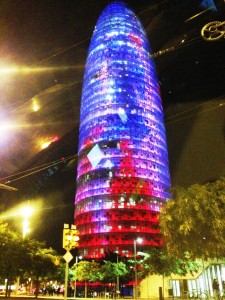 Torre Agbar, the third tallest building in Barcelona, resplendent in lights.